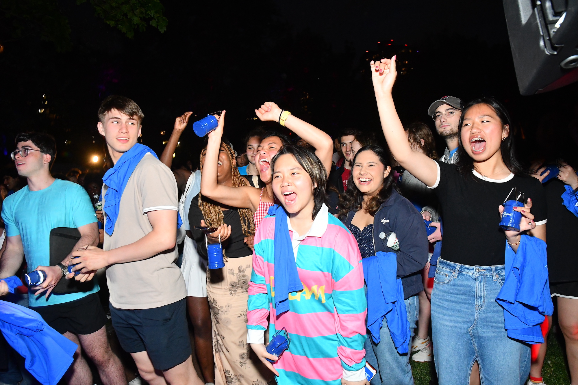 A crowd of second-year students cheering at U-Night.