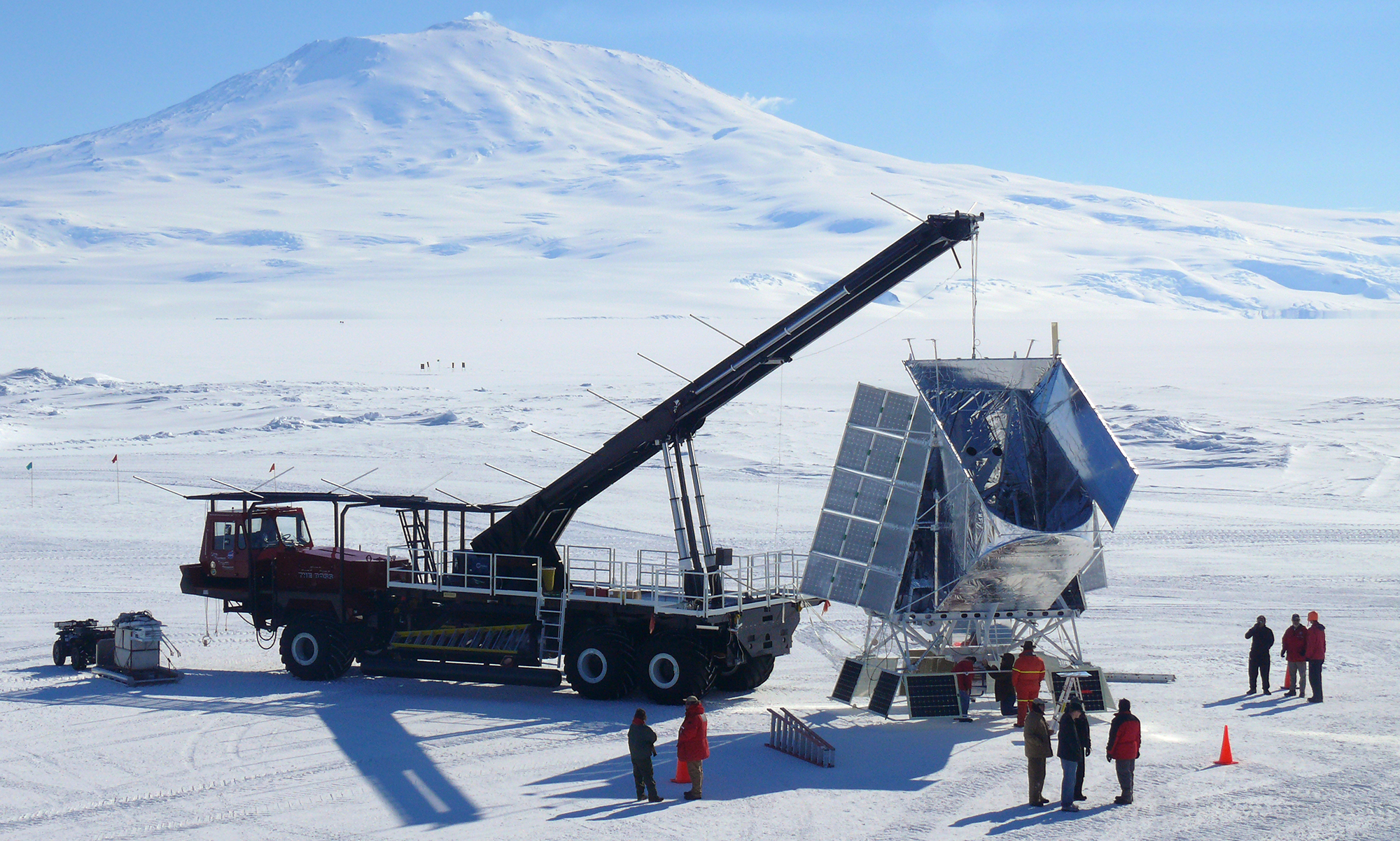 BLAST telescope being lifted by crane in Antarctica
