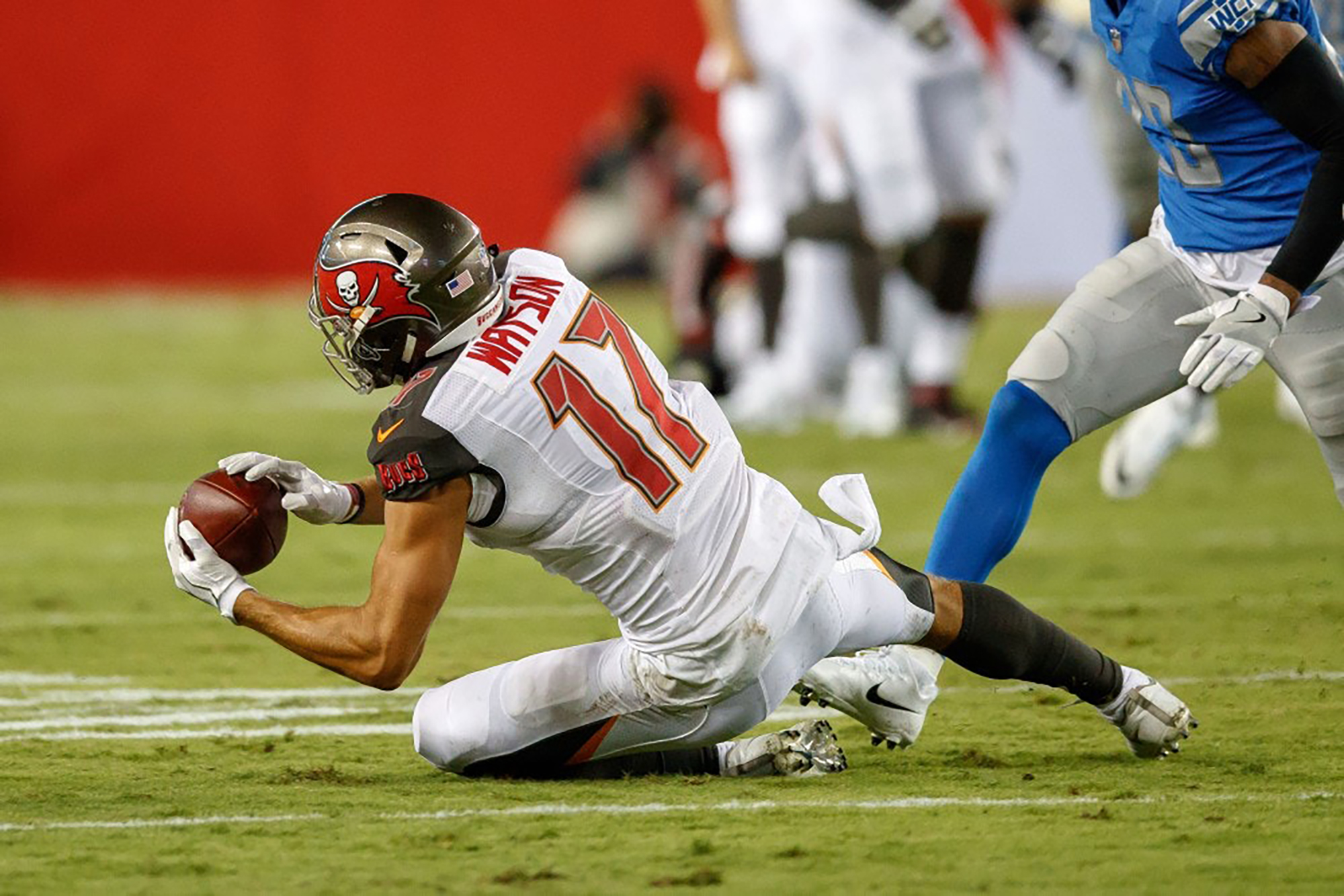 Former Penn wide receiver Justin Watson, now with the Tampa Bay Buccaneers, catches a pass in a preseason game against the Detroit Lions.