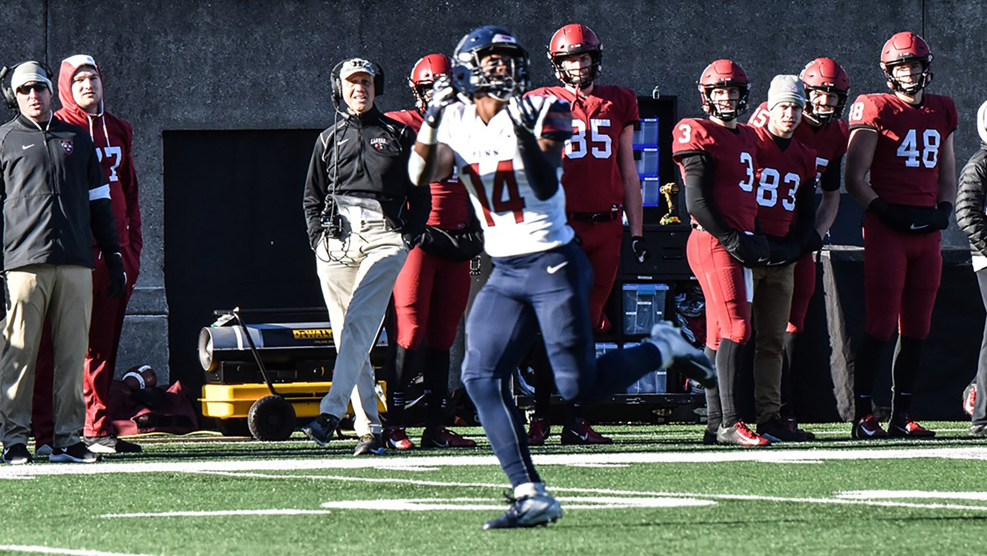 Sophomore Rory Starkey, Jr. prepares to catch a pass against Harvard at Harvard Stadium.