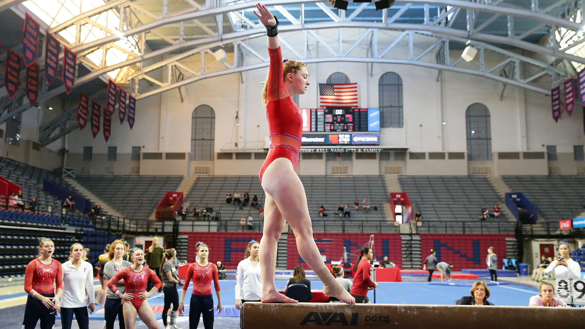 Rebekah Lashley of the gymnastics team performs on the beam at the Palestra.