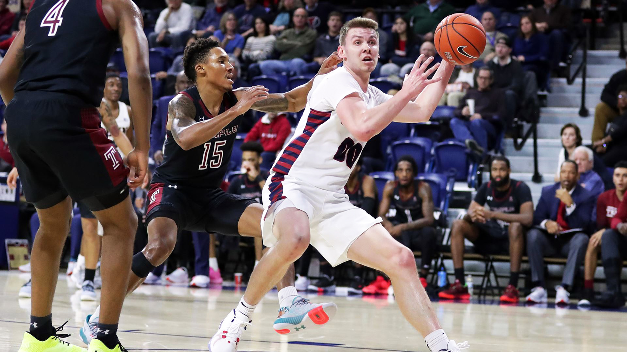 Senior guard Ryan Betley makes a move with the ball against Temple at the Palestra.