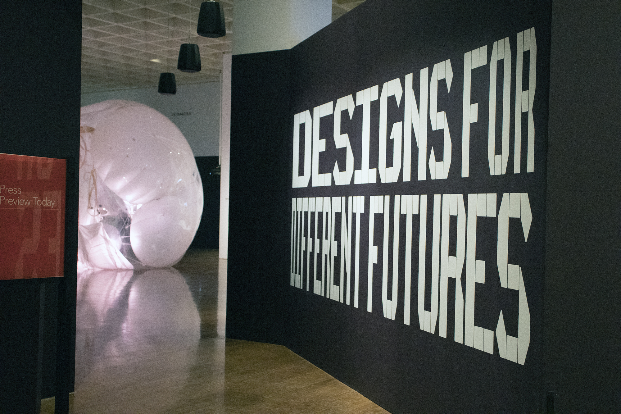 Entryway to the Designs for Different Futures exhibit, text written in large letters on the wall