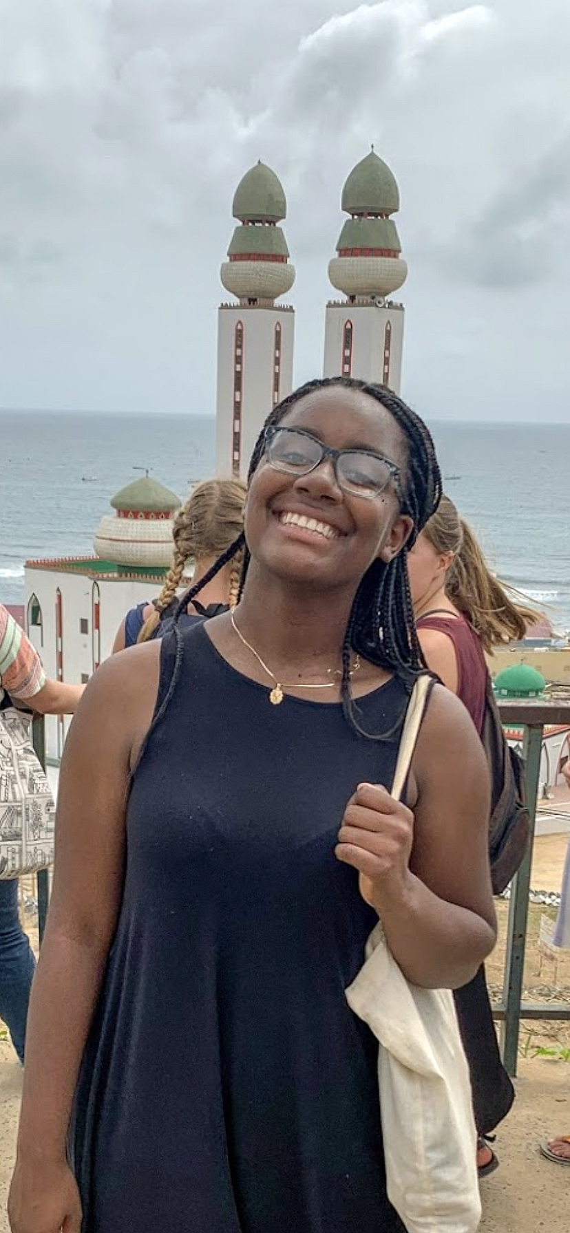 Nakeeya Garland smiling with ocean view in background