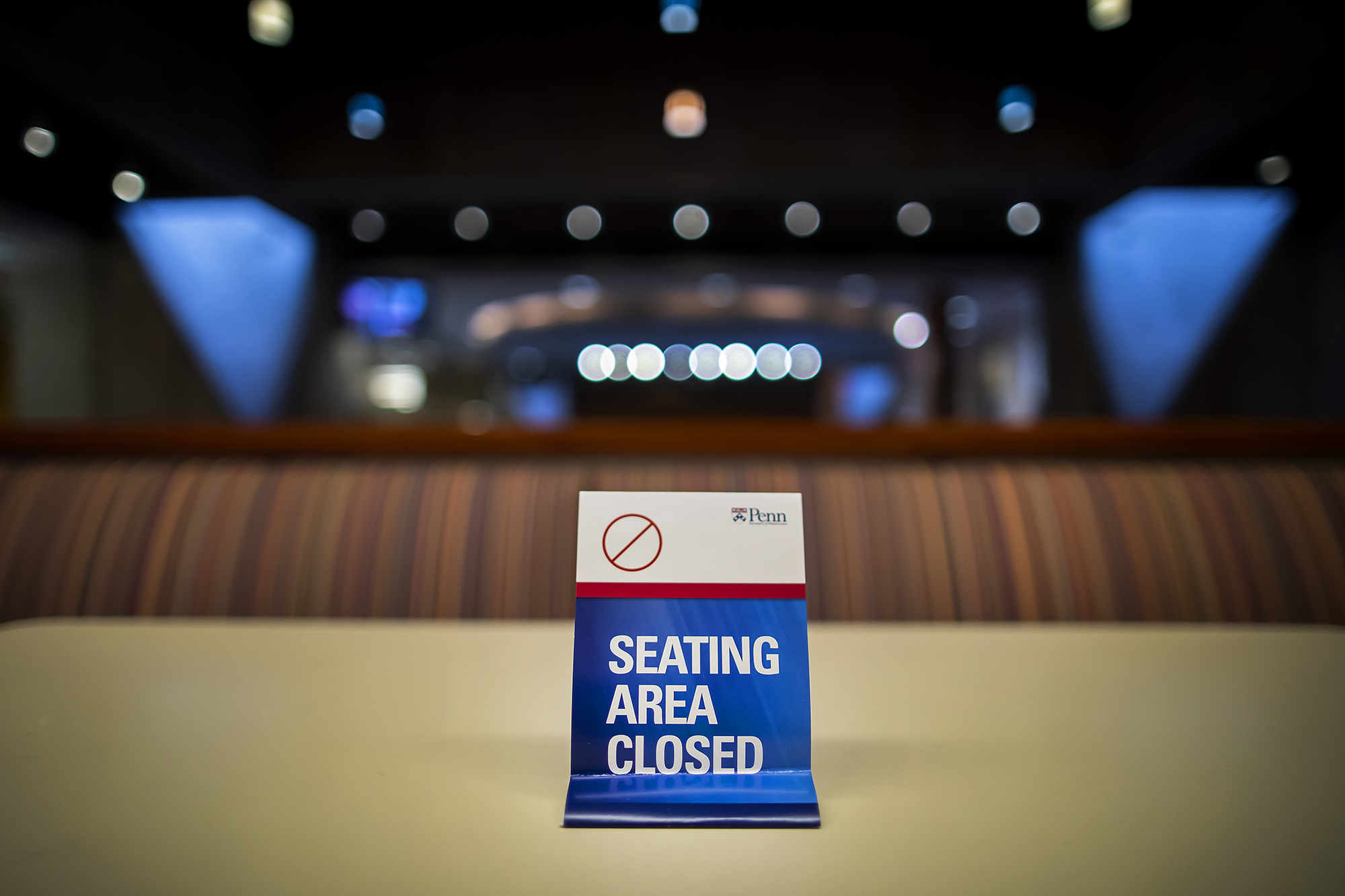 seating area closed sign on a table