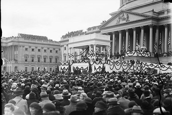 A crowd is shown outside the U.S. Capitol in 1933 on the day of Franklin Delano Roosevelt's inauguration.