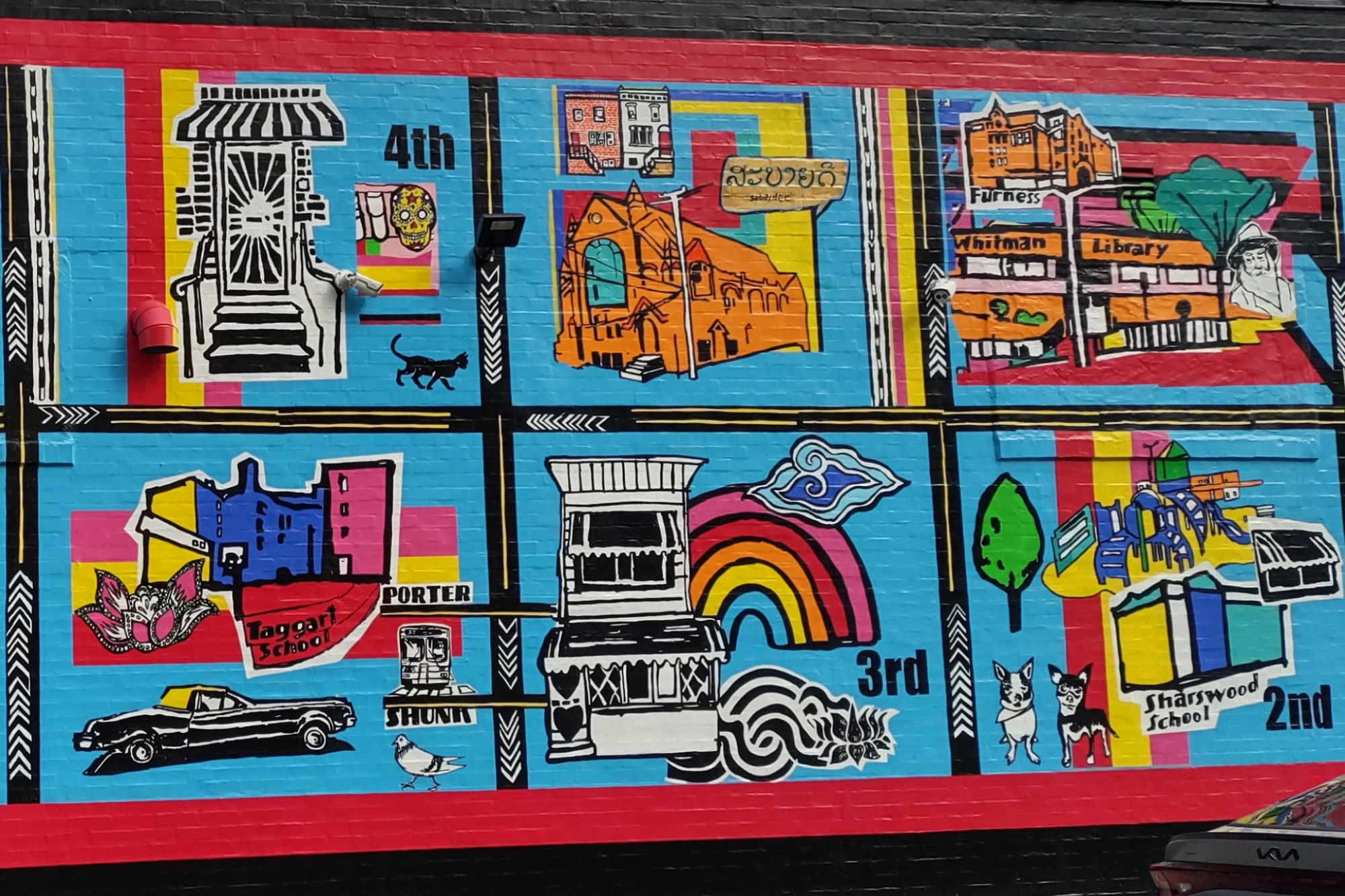 six squares with brightly painted images including a train, a rainbow, and a library building