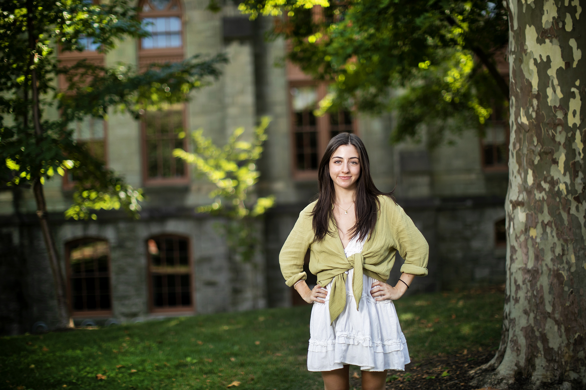 Julia Youngman stands outside on Penn's campus. 