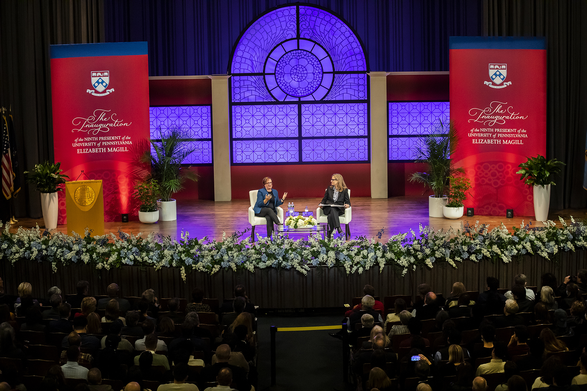 Justice Elena Kagan sits next to Penn President Liz Magill on stage at Irvine Hall