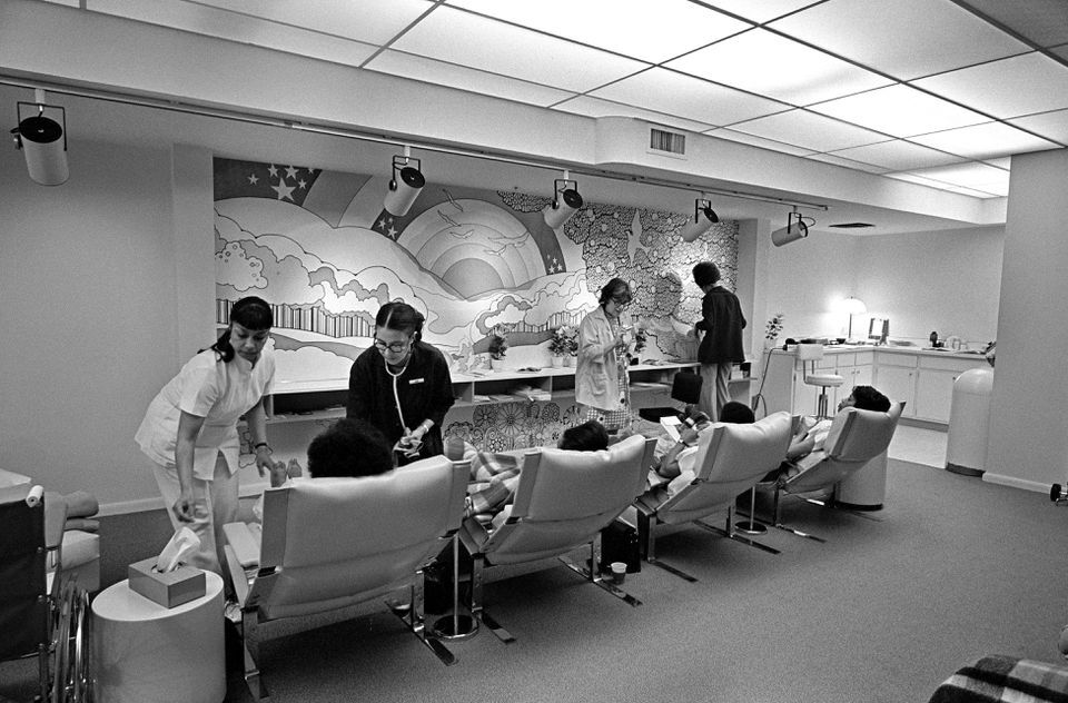 Women in chairs inside a clinic lounge