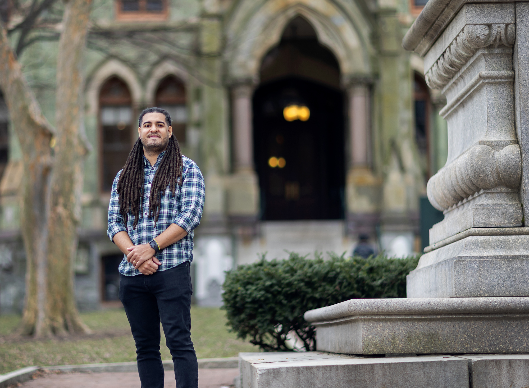 Daniel Morales-Armstrong stands in front of Penn's College Hall.