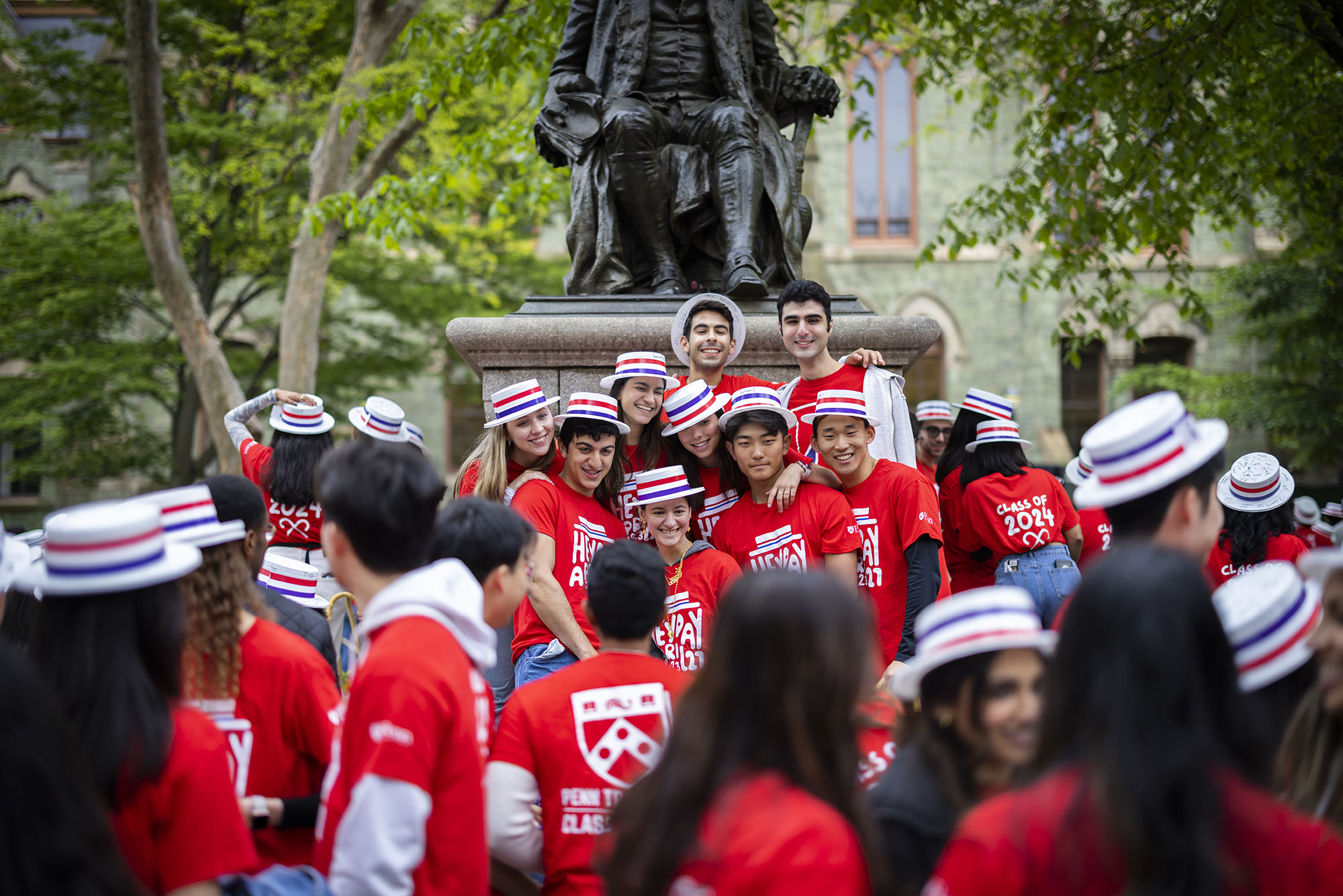 students at hey day in front of ben statue