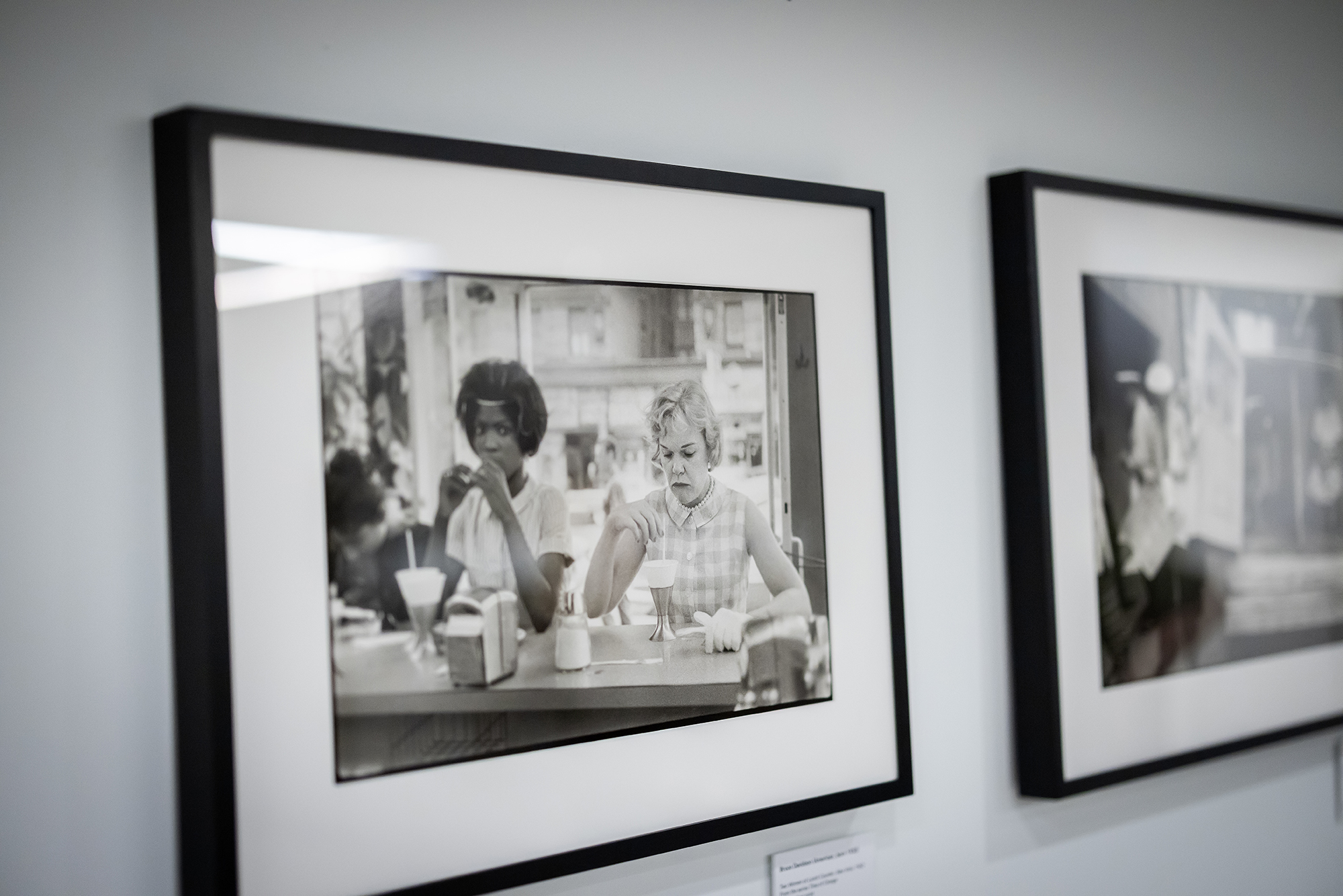 A photo by photographer Bruce Davidson on a gallery wall in Penn Libraries.