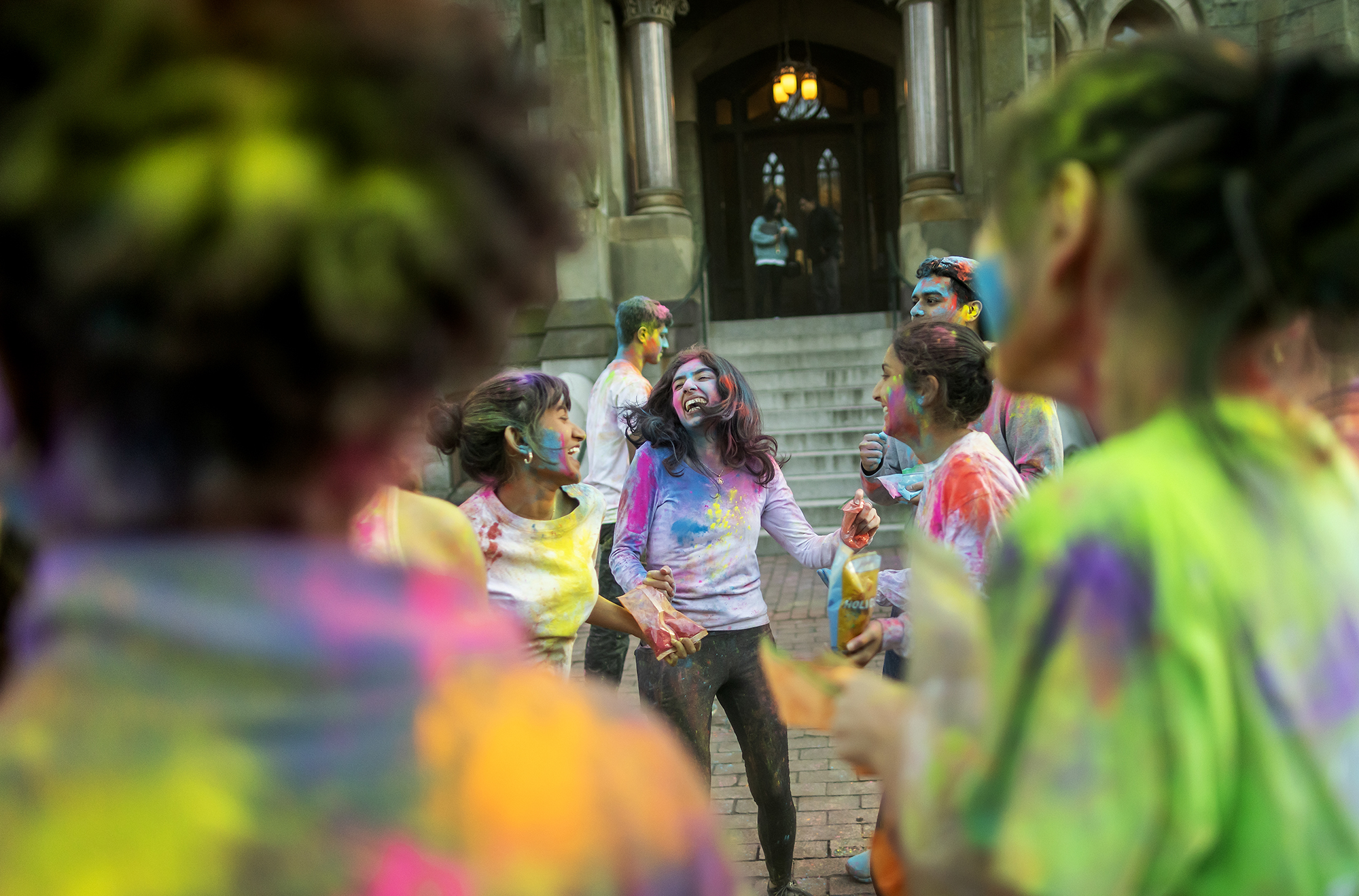 Penn students celebrate Holi in front of College Hall.