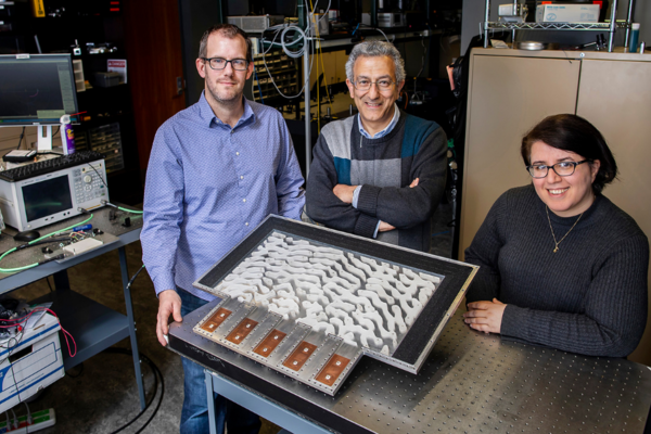 Nader Engheta, center, and two researchers who worked on the metamaterial project