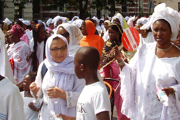 Group of Senegalese immigrants in the street.