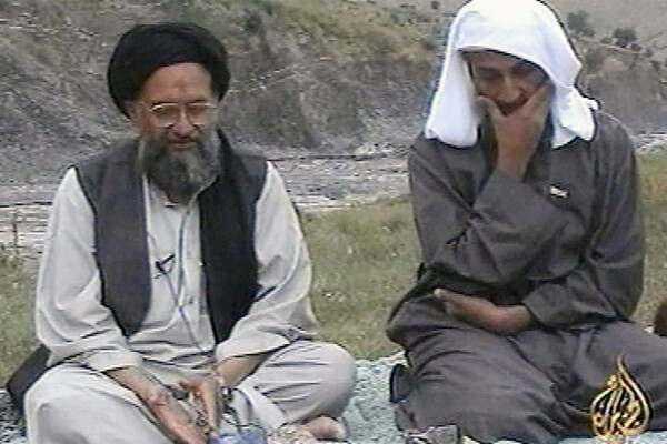 Osama bin Laden, right, listens as his top deputy Ayman al-Zawahri speaks at an undisclosed location in 2002