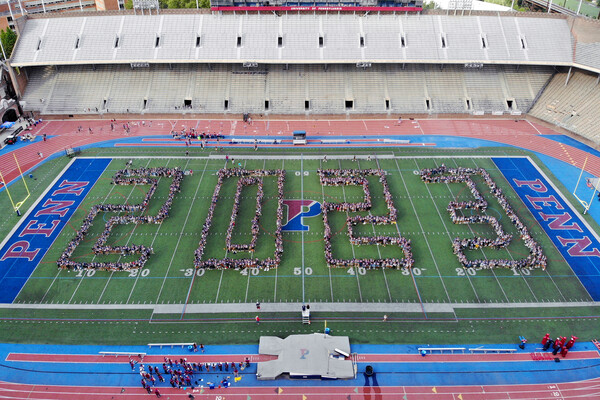 Aerial view of Franklin Field with bodies in formation spelling out 2023.