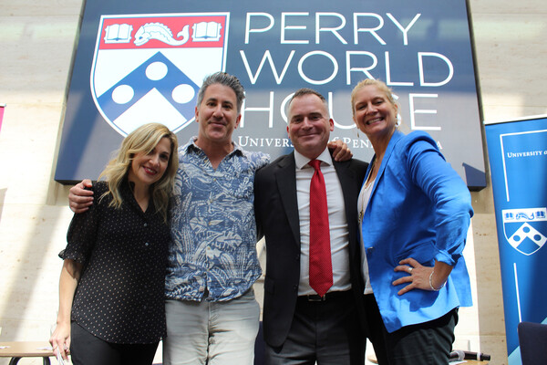 Lauren Bernstein, Michael Solomonov, Michael Weisberg, and Amanda Freitag pose in front of a Perry World House sign.