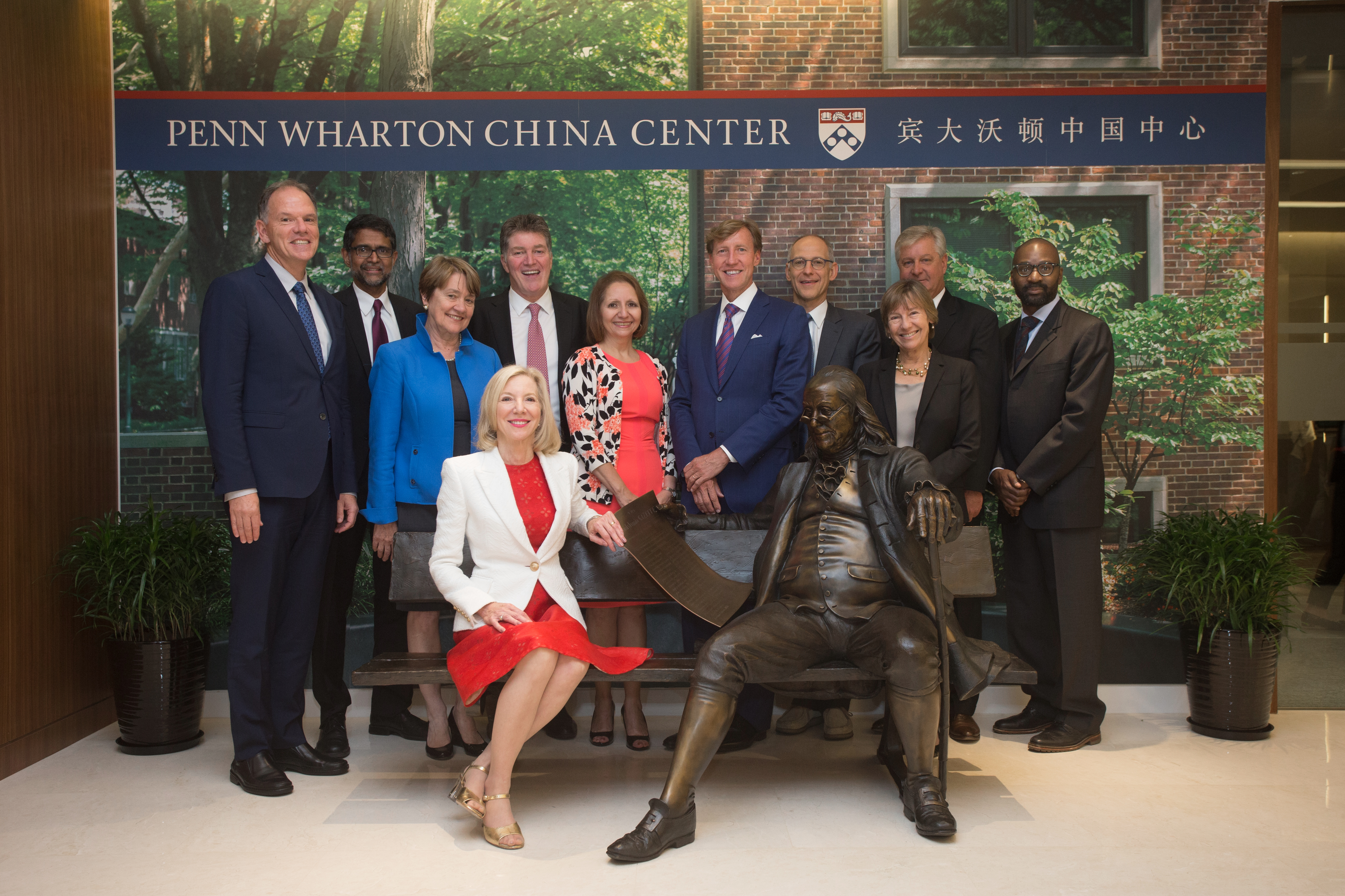 Amy Gutmann with Deans and Ben on the Bench