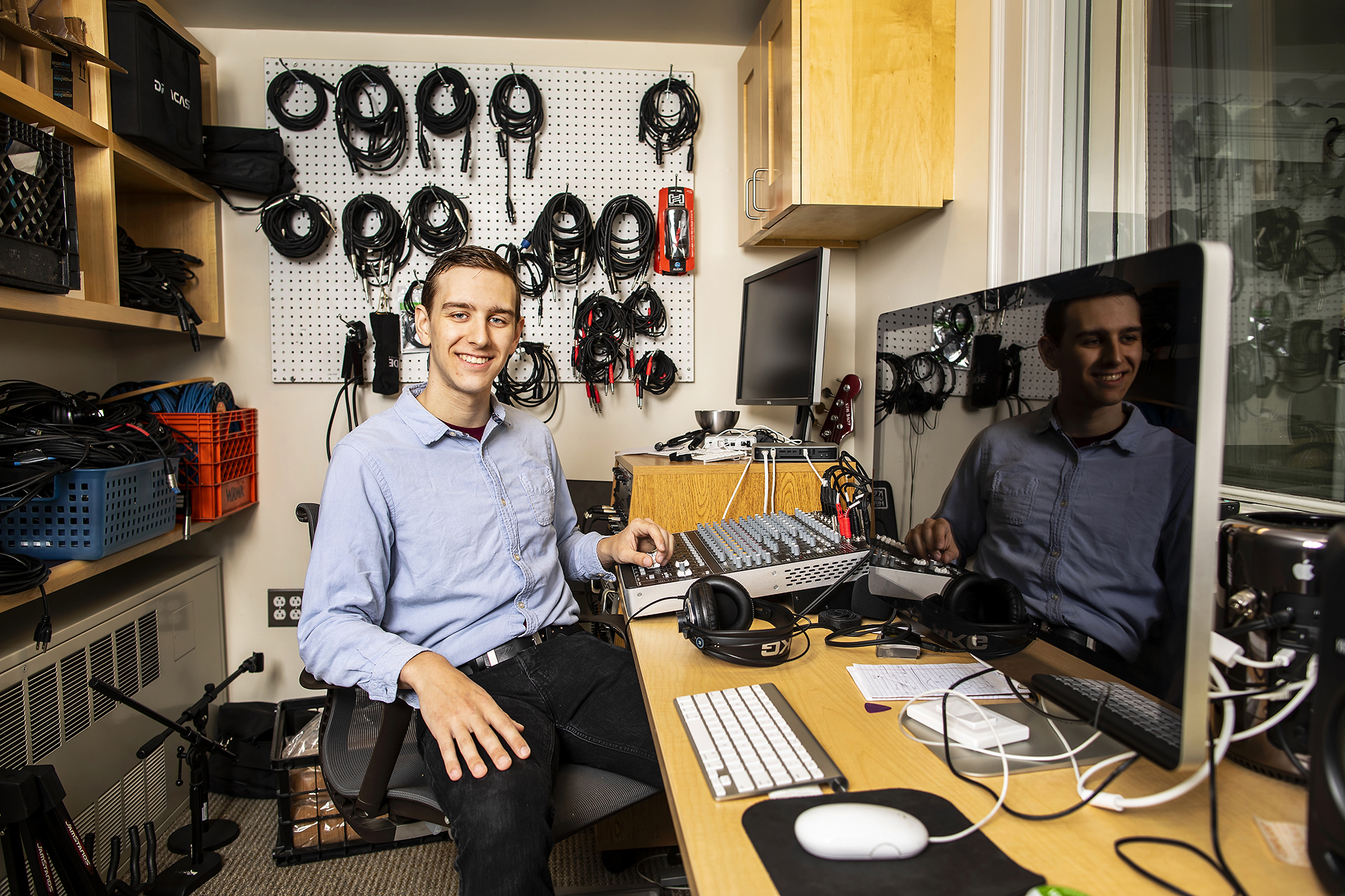 Penn student Nicholas Seymour in the Kelly Writers House recording studio. 