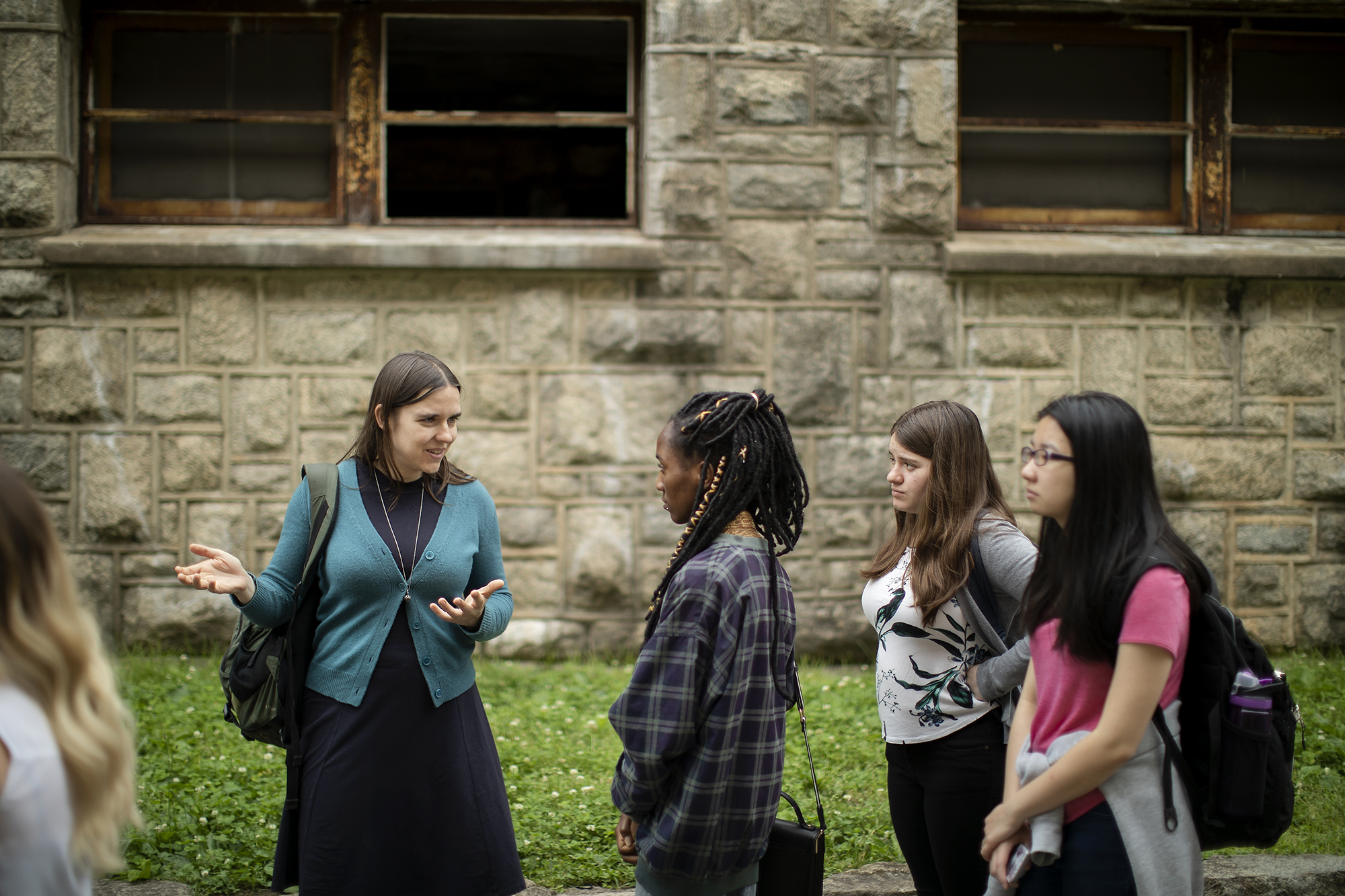 Penn criminologist Aurelie Ouss (in green) discussed her research during the mindCORE workshop and visited Eastern State with the group of students.