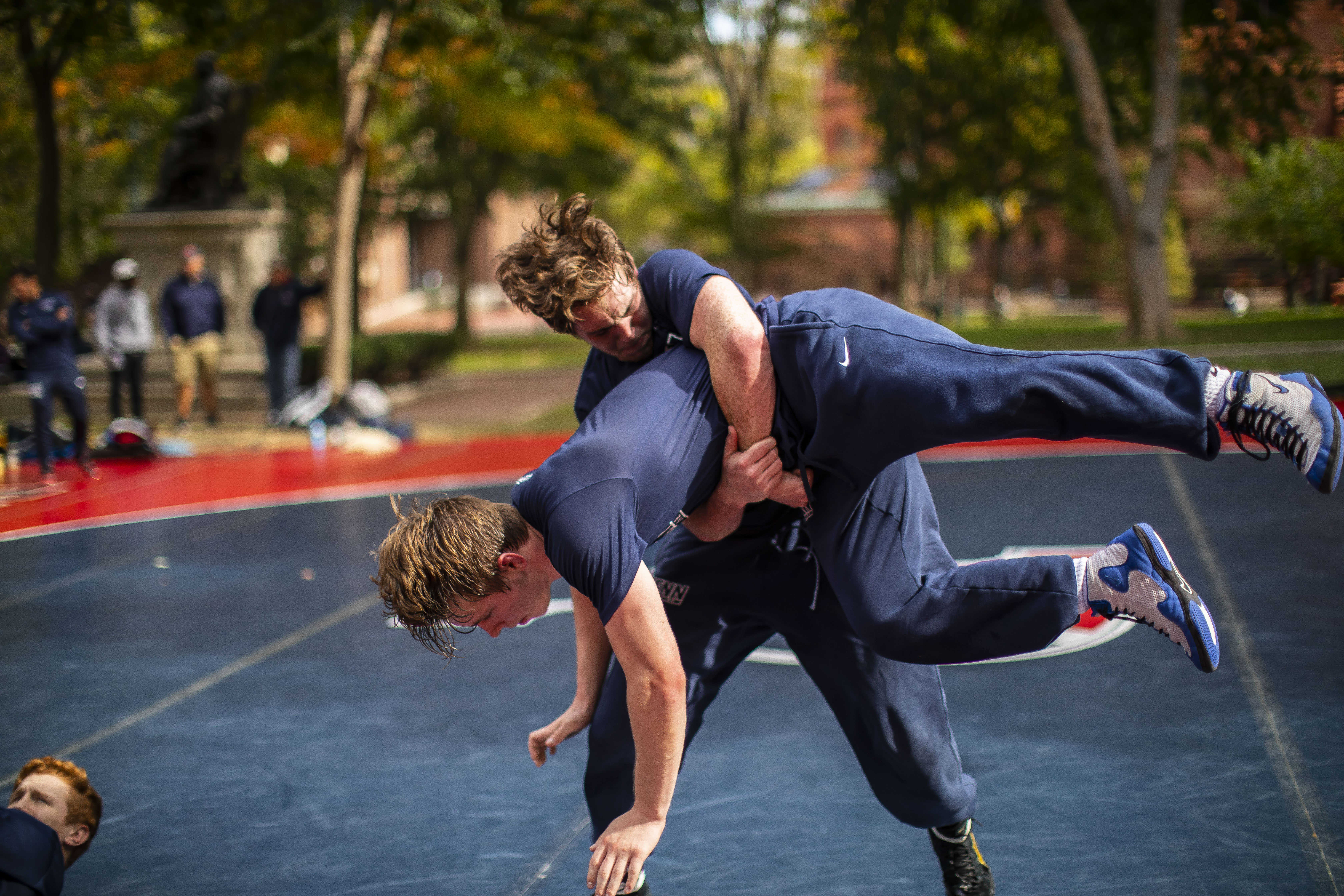 closeup-of-wrestler-body-slam-in-outdoor-practice