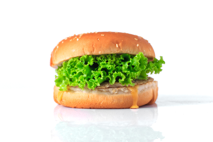 hamburger bun stuffed with lettuce and no burger