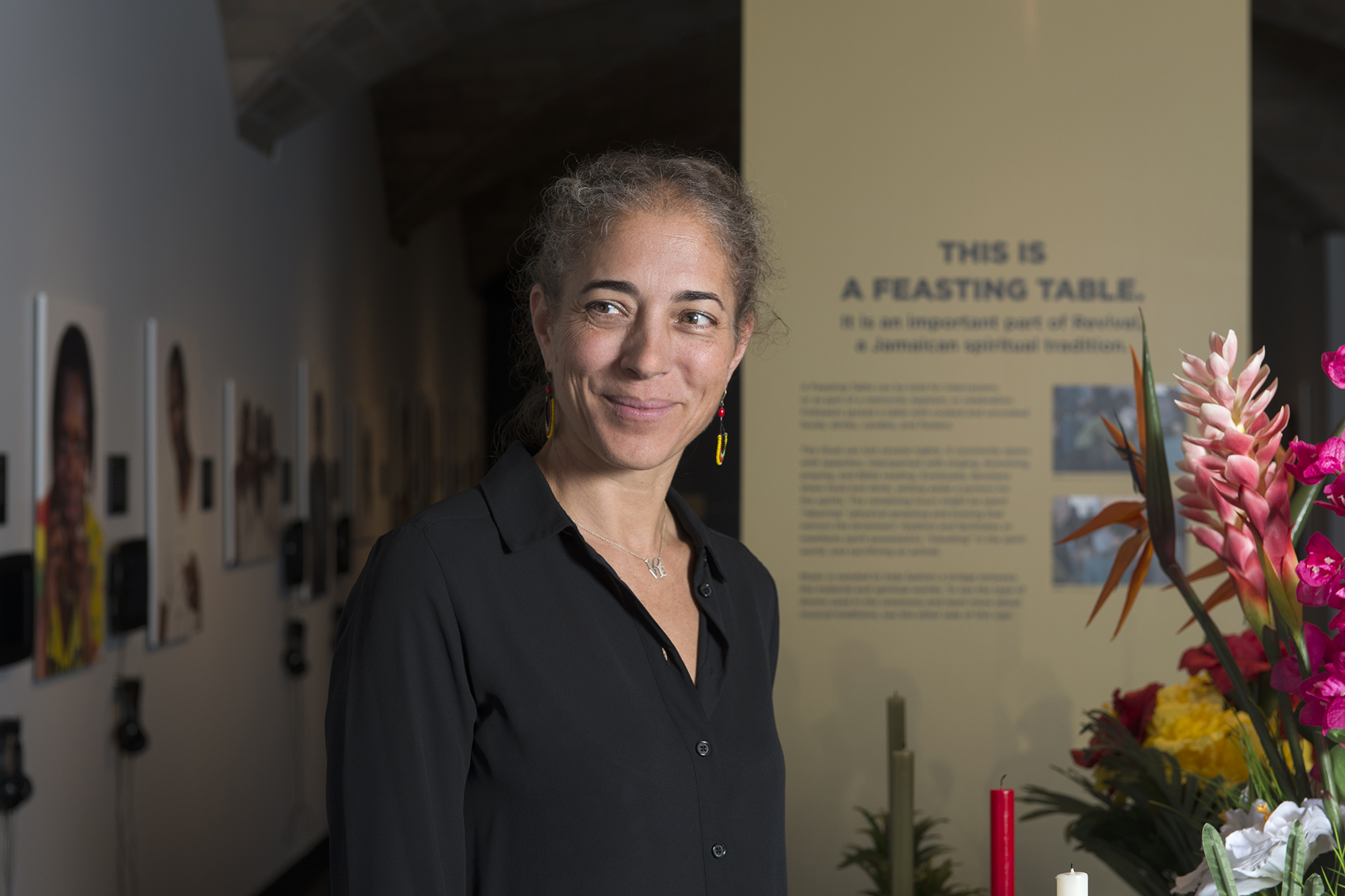 Deborah Thomas at the “Bearing Witness: Four Days in West Kingston” exhibit.