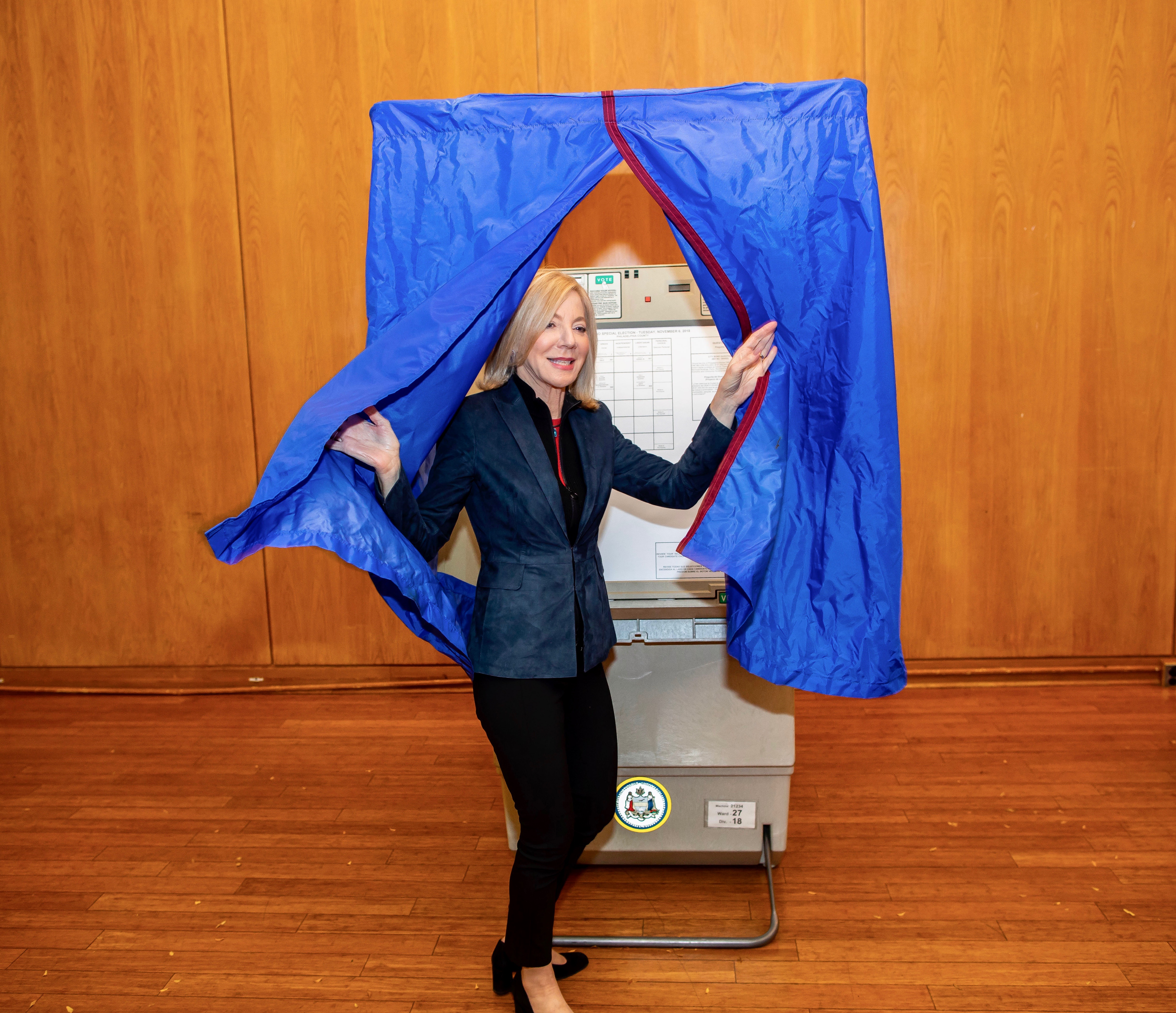 Penn President Amy Gutmann exits the voting booth