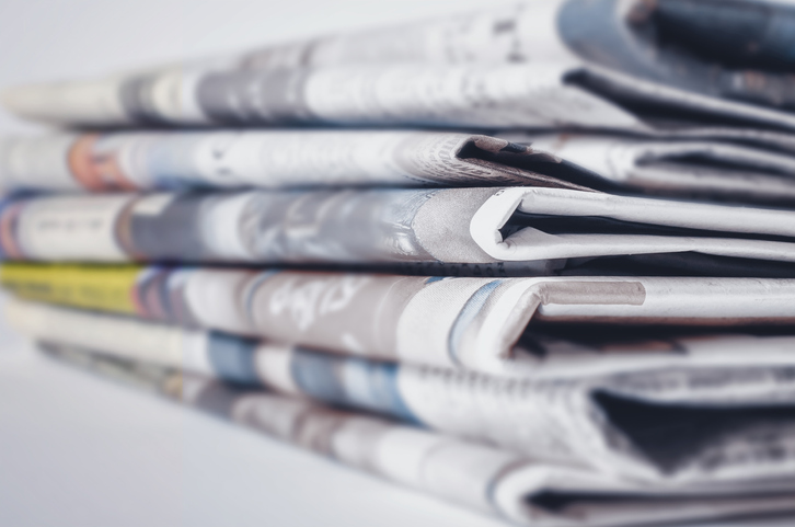 closeup of stack of newspapers