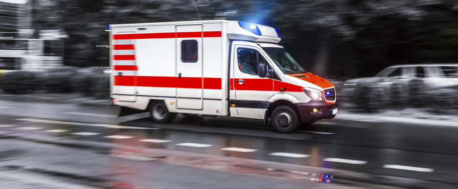 ambulance driving on street