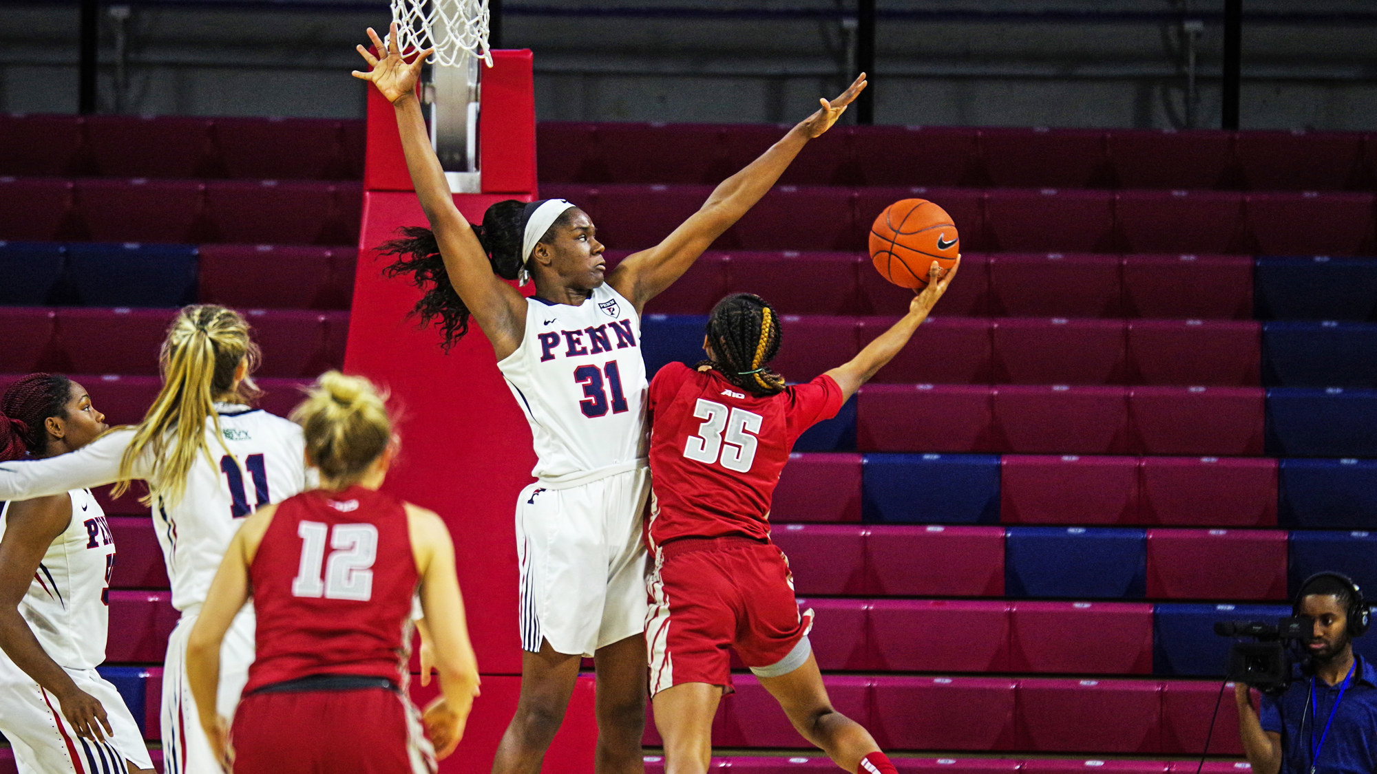 Center Eleah Parker attempts to block a shot during a game at The Palestra