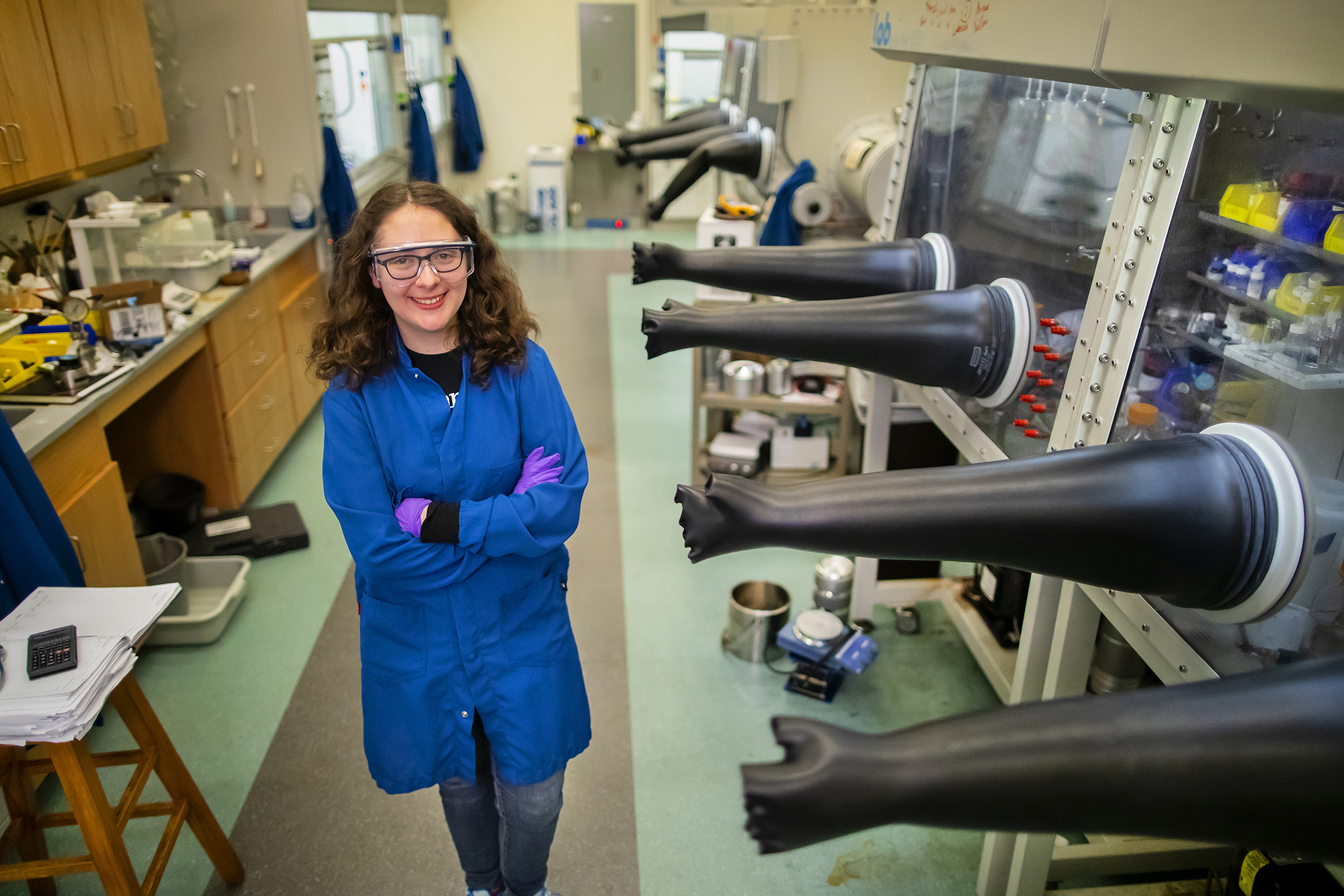 grant posing in front of glove boxesGrant has published over ten papers during her time as a PhD student in the Department of Chemistry. Her latest paper is the result of work that was spread across nearly three years, from the initial study design to publishable results.  inside a lab