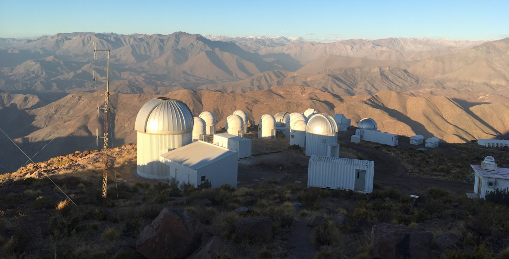 Jain telescope aerial view with mountains in background