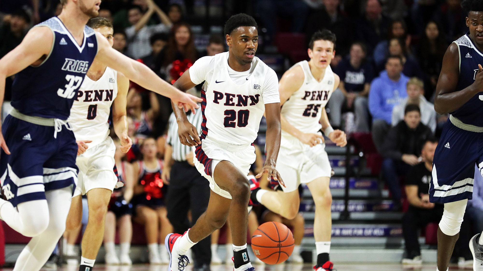 Freshman guard Bryce Washington dribbles up the court against Rice at the Palestra.