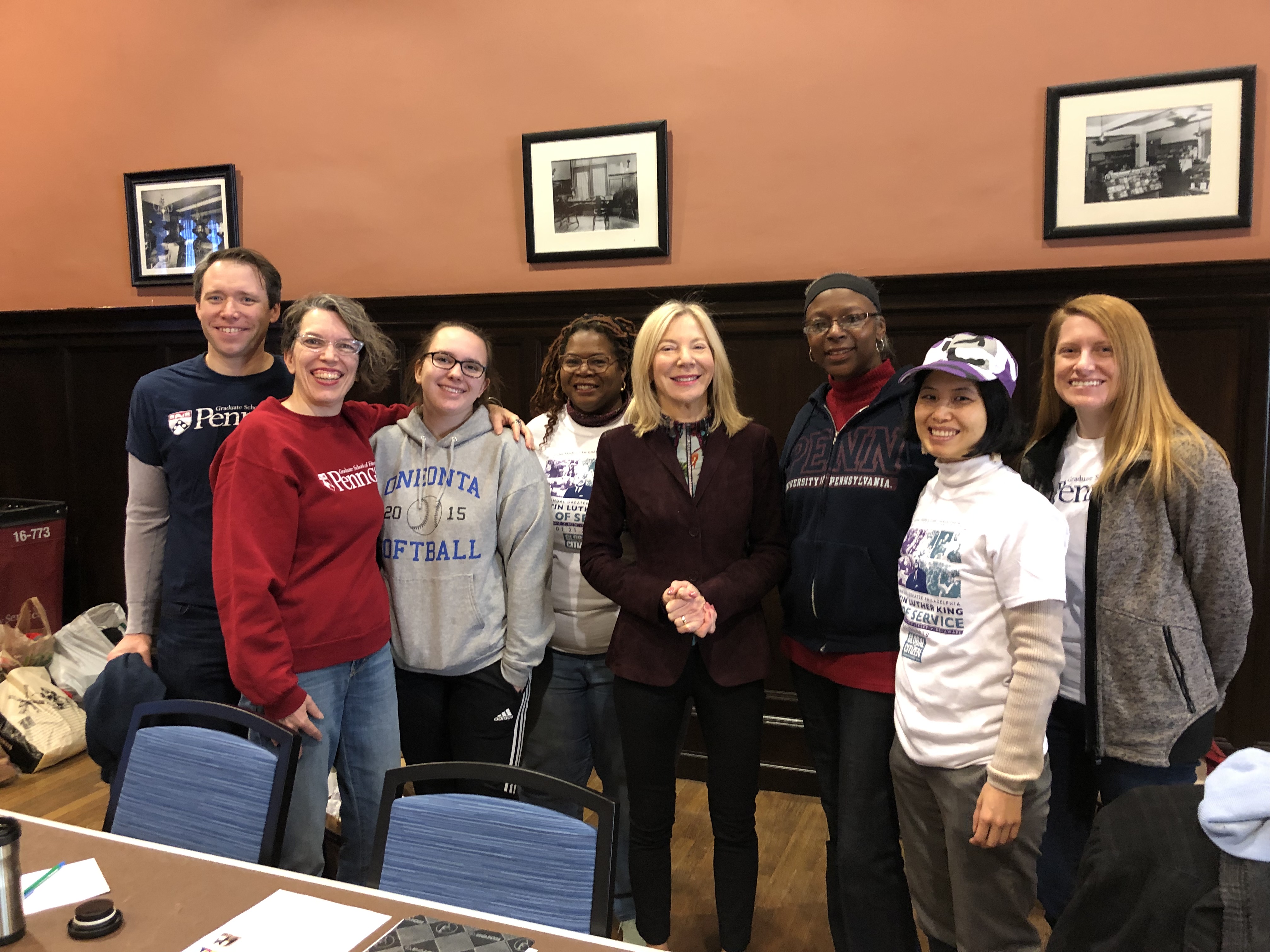 Amy Gutmann with Penn students and staff