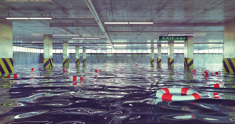 flooded parking garage with floating life preservers