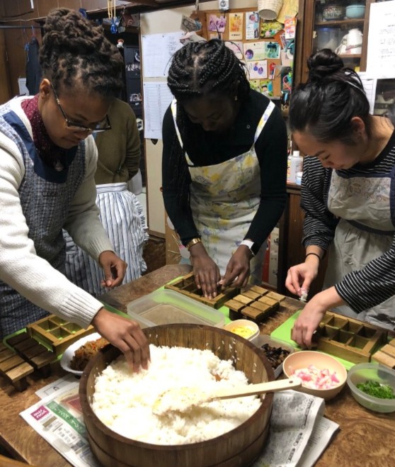 Penn students making sushi