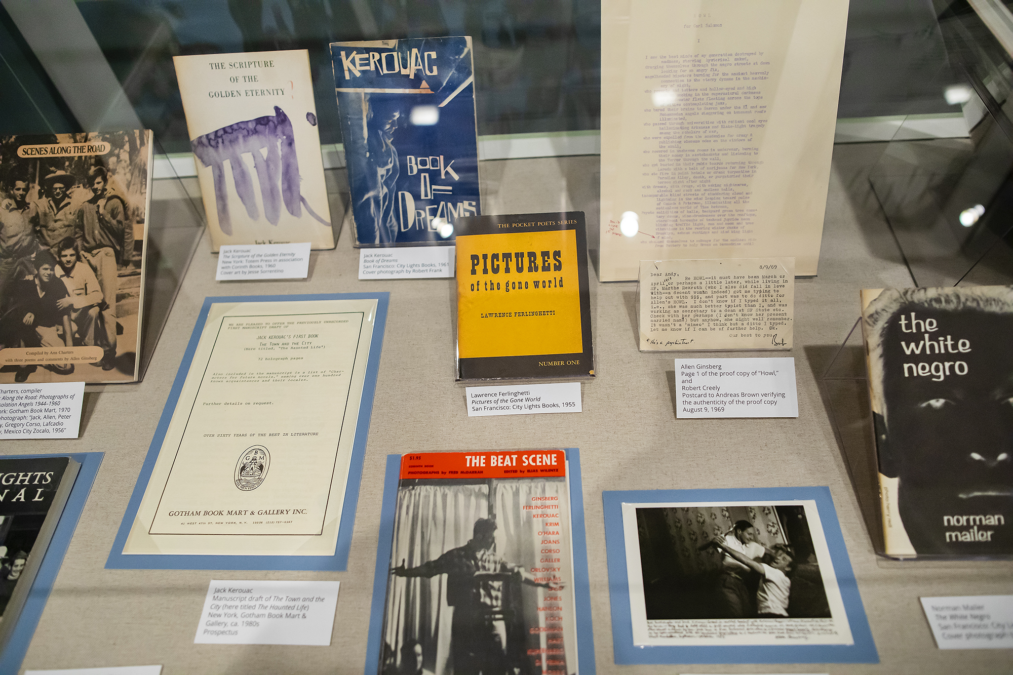 Books and papers in display case.