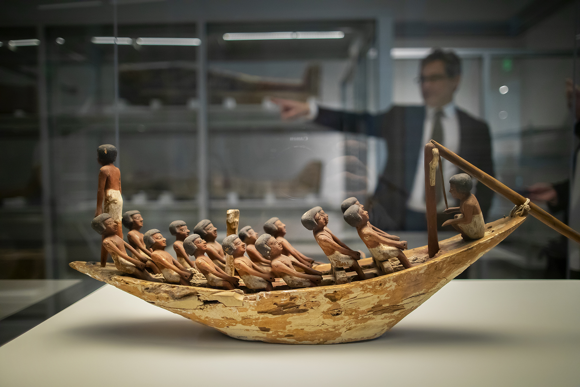 a 4,000-year-old model of a rowing boat featuring 16 figures