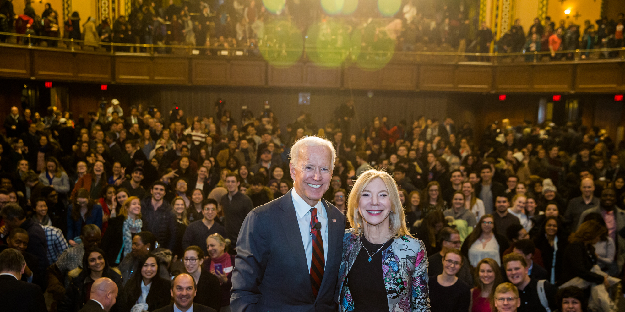 joe biden and amy gutmann on stage at end of event