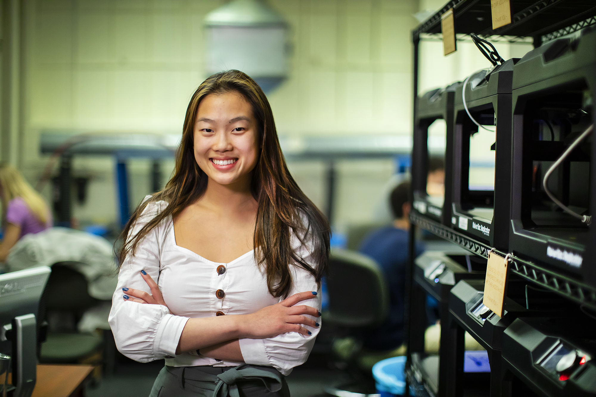 Angela Lin in an engineering lab