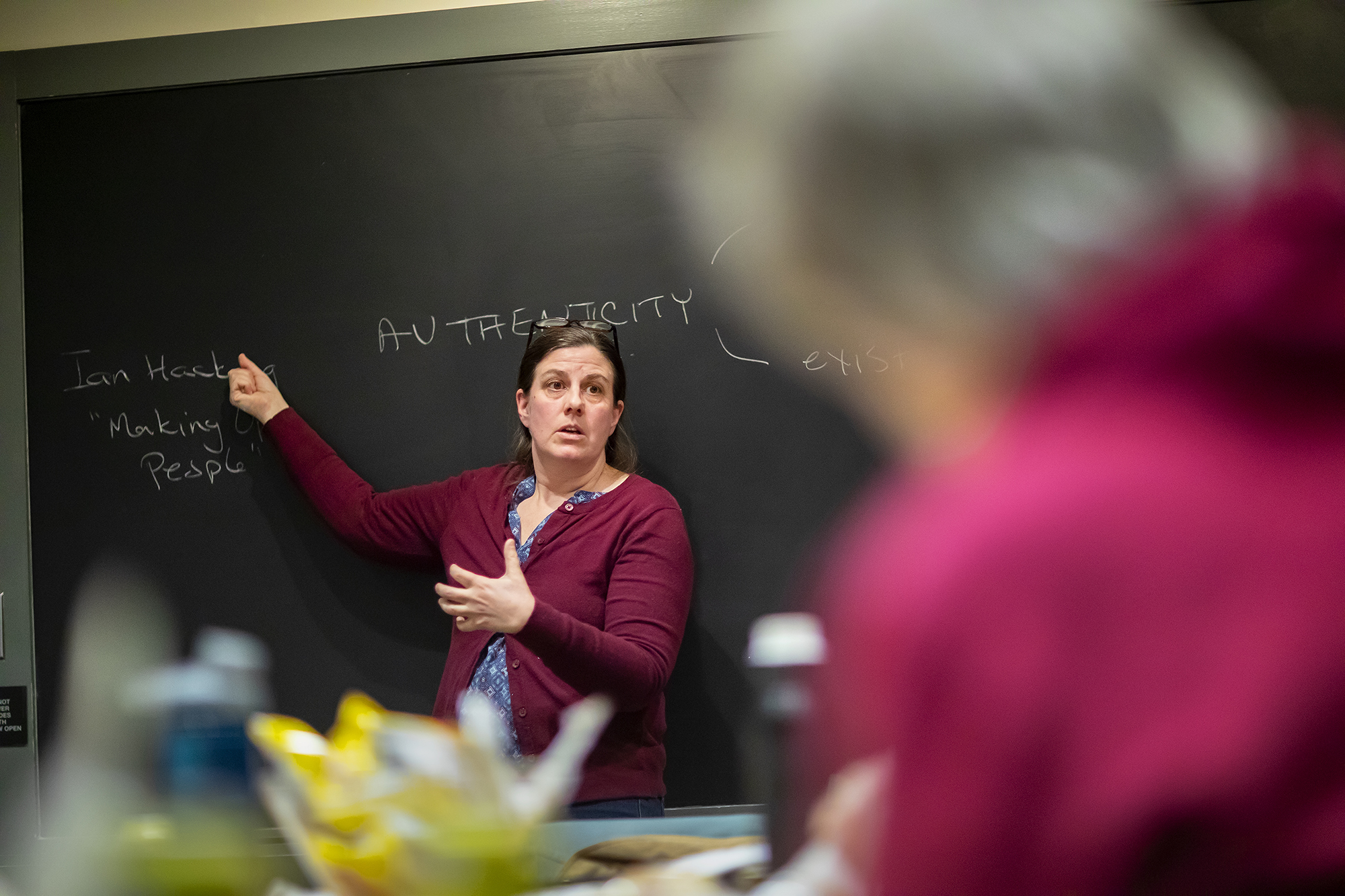 Karen Detlefsen teaching at a blackboard