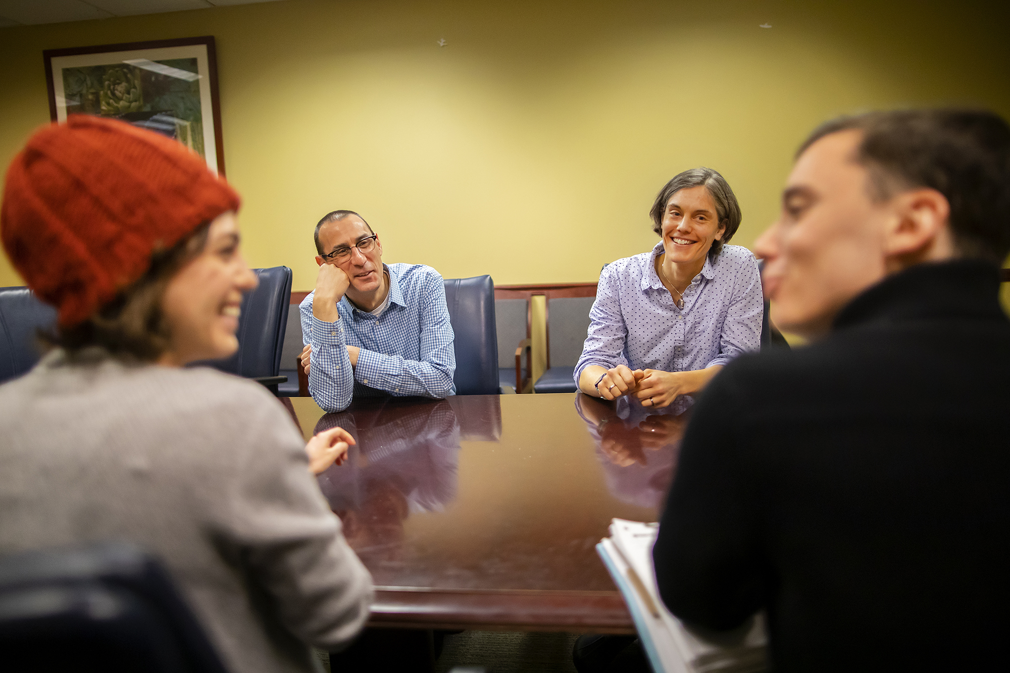 tobacco researchers gathered around a table