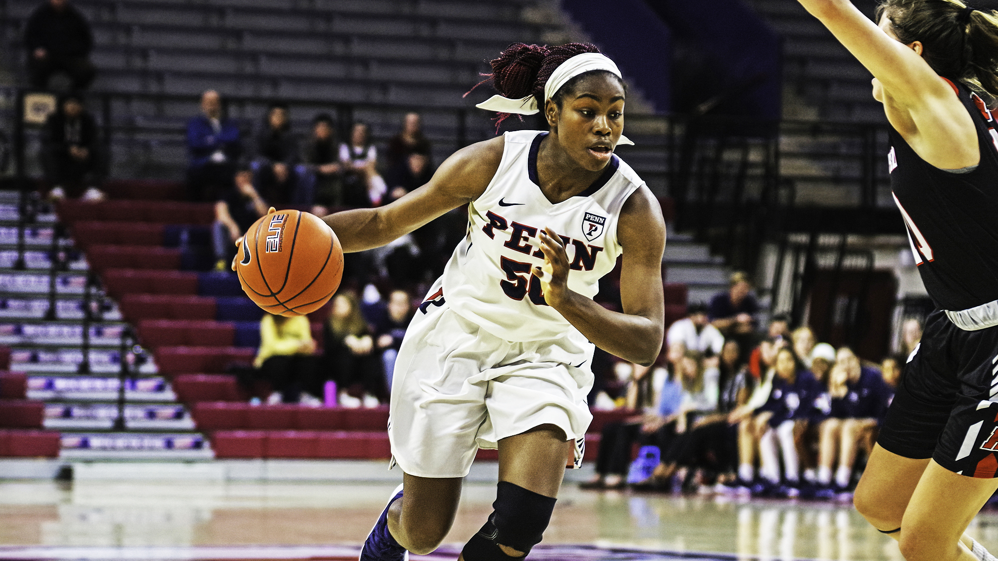 Princess Aghayere dribbles to the basket during a game at the Palestra.