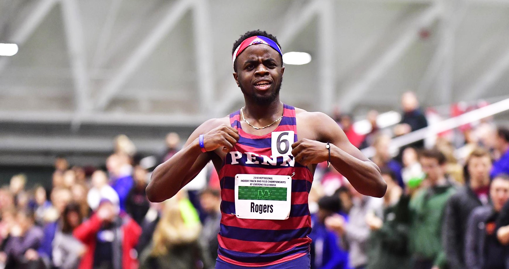 Sprinter Calvary Rogers celebrates after winning a race.