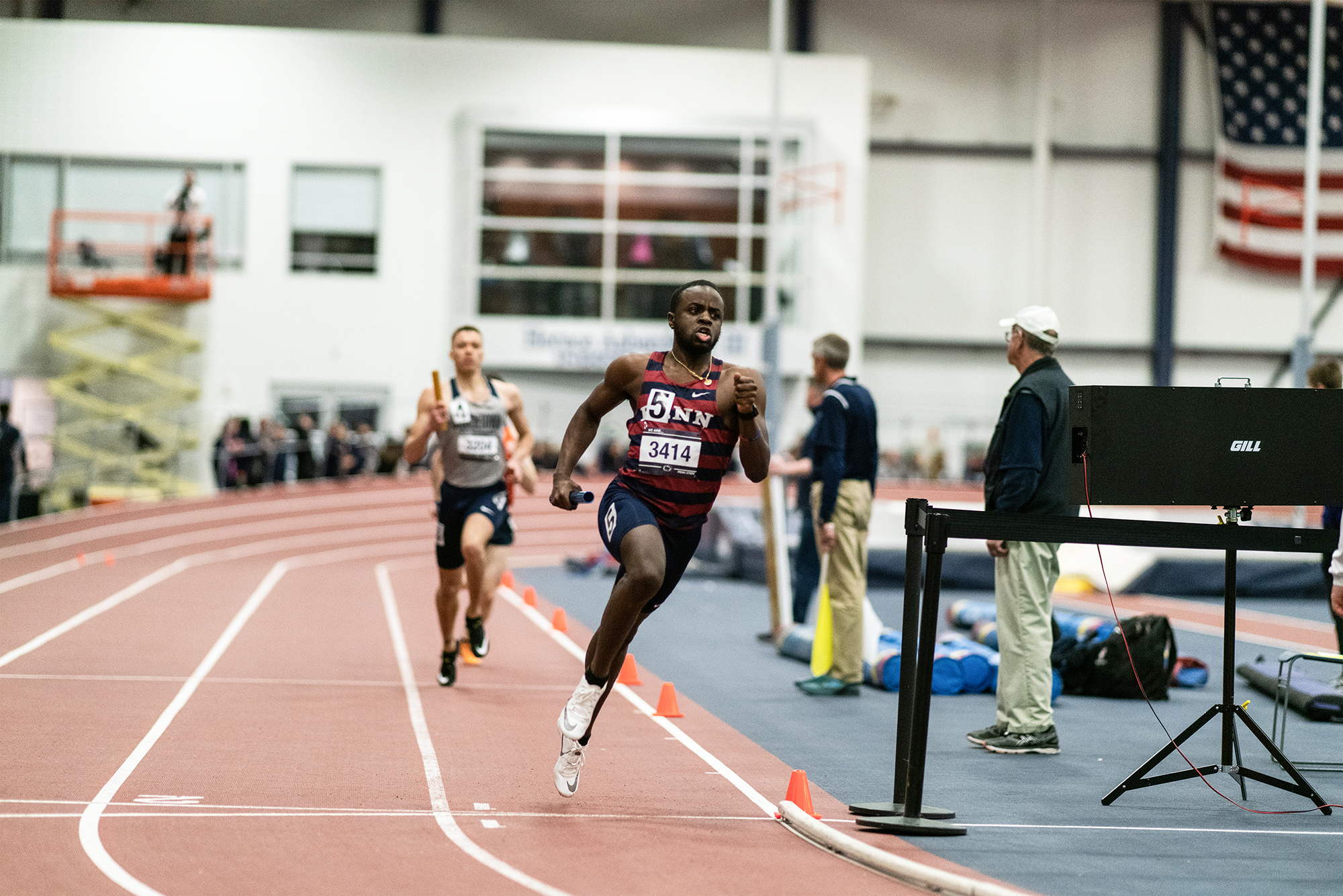 Calvary Rogers races around the track during an indoor meet.