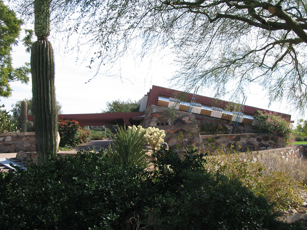 Taliesin West house exterior with cactus and trees