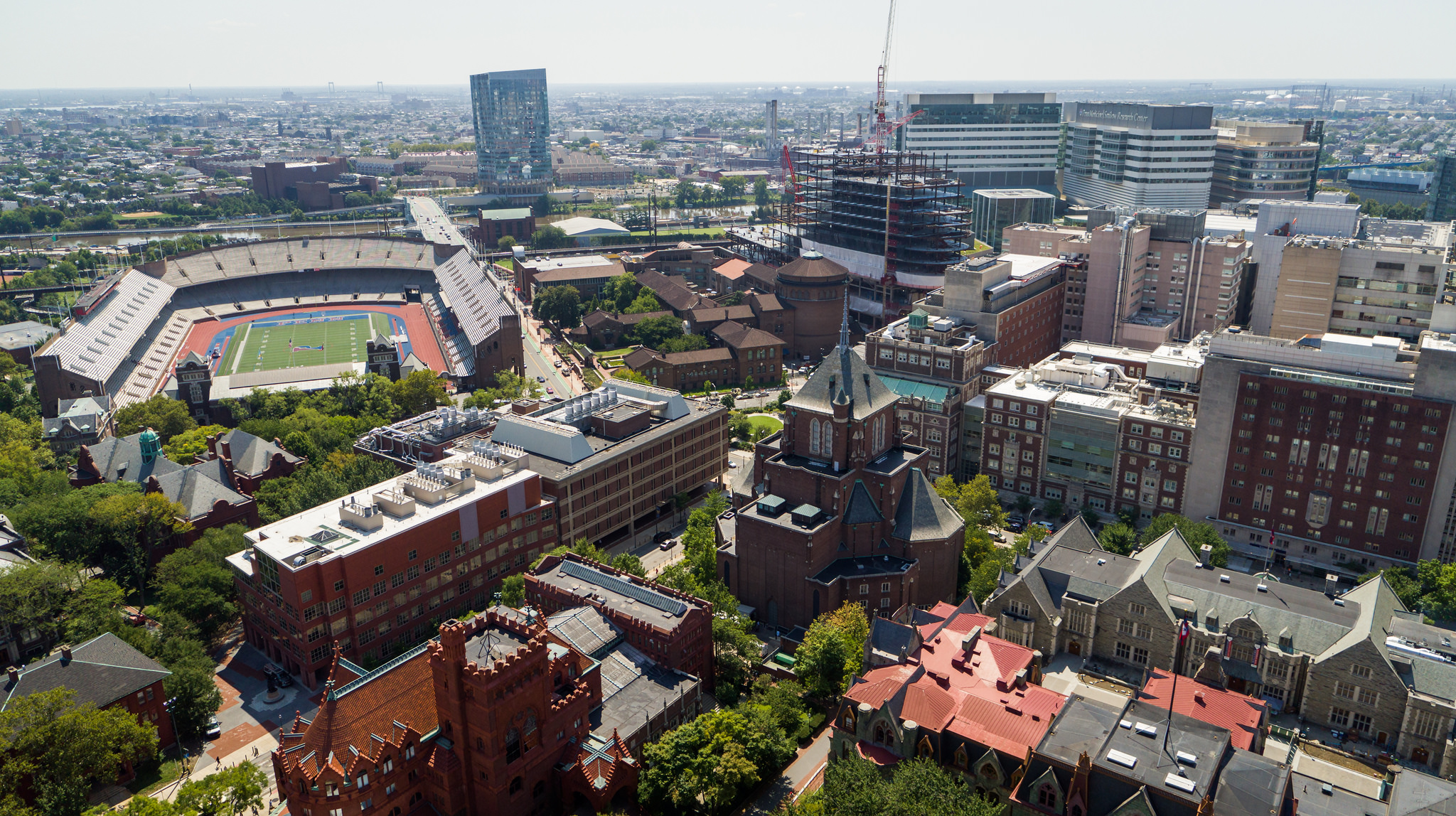 An aerial view of buildings and a stadium in Philadelphia. 